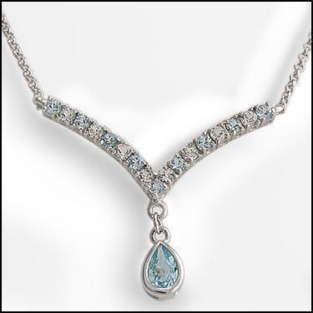 5.55 CT Blue Topaz & White Sapphire
